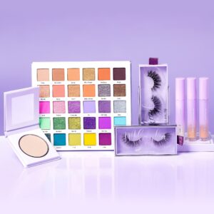 A promotional photo of Mikayla's whole collection with Glamlite. The collection includes highlighter, eyeshadow palette, false lashes and lip gloss