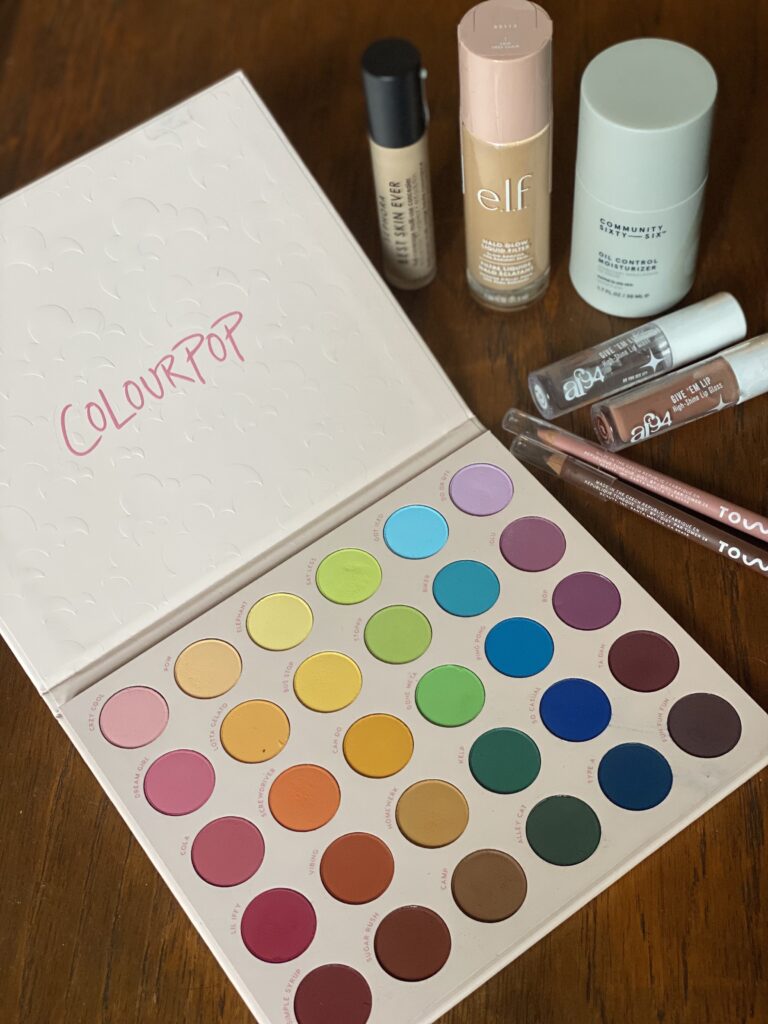 A photo of a few of the products talked about in this week's episode - including the colour pop palette