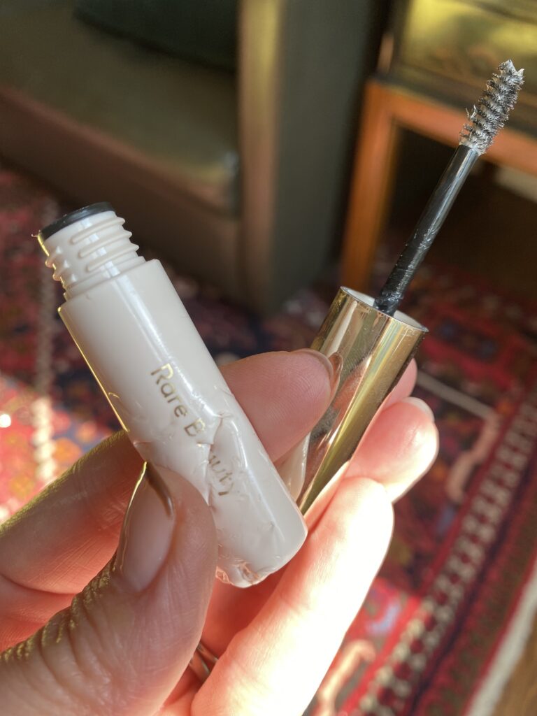 A photo of the Rare Beauty brow gel - the container is chewed up