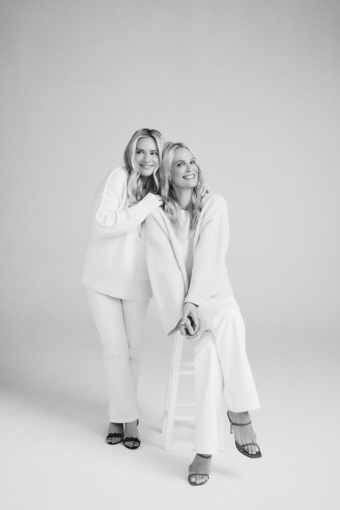 a black and white photo of Molly Sims and Emese Gormley